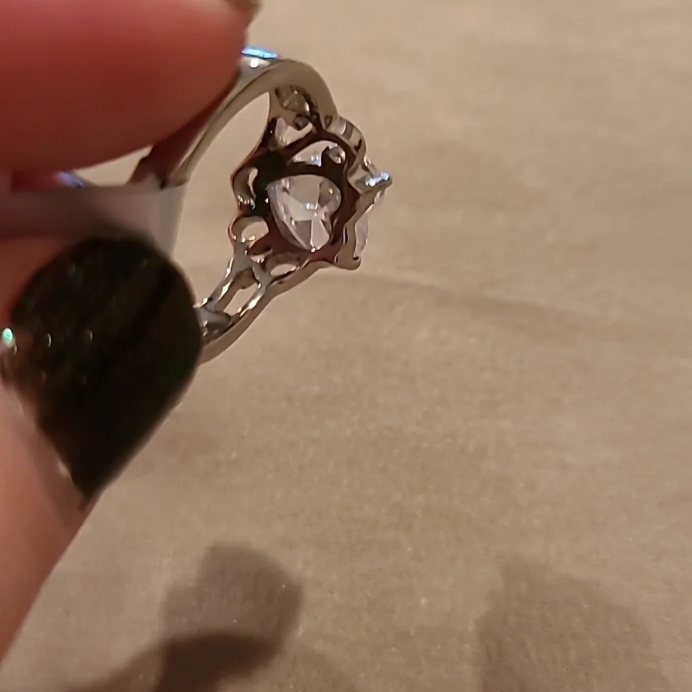 Heart shape cubic zirconia swirl band stainless steel ring